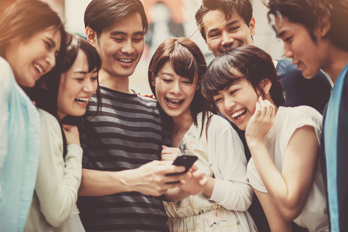 Group of young japanese people with smart phone